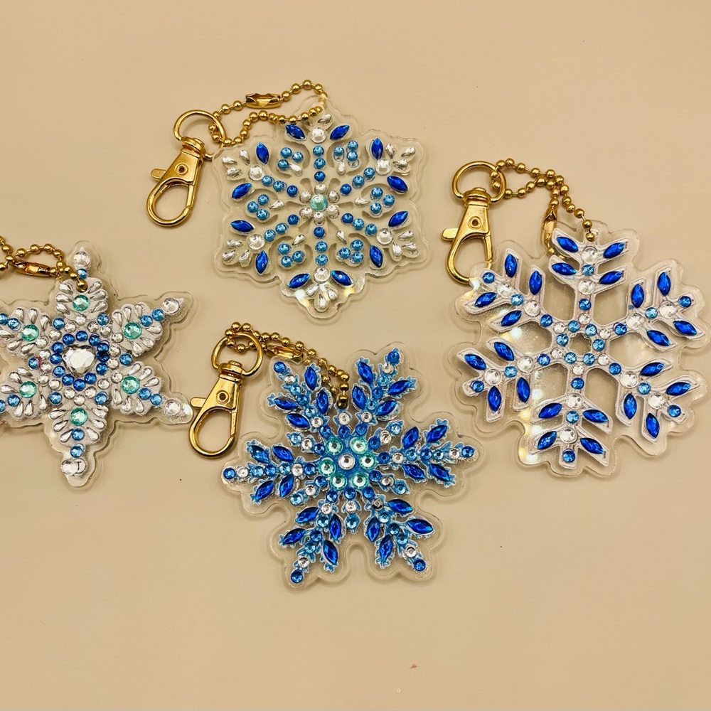 4 Christmas rhinestone snowflake ornaments. Handmade. Decorated on both sides.